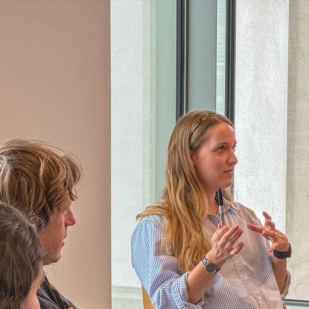 Woman speaking at a meeting